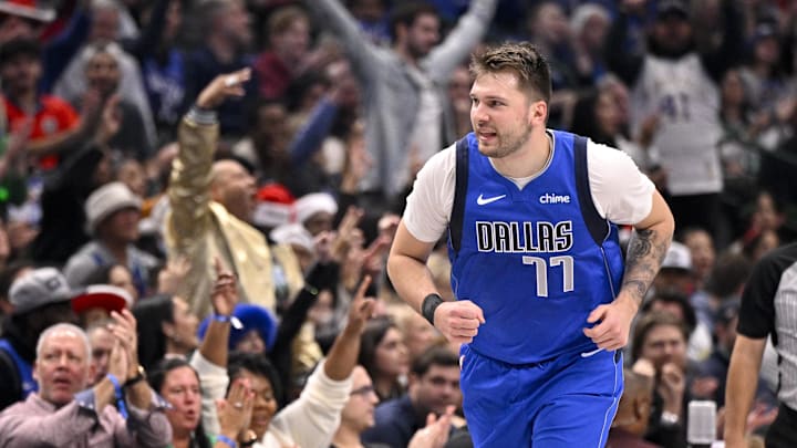 Dec 25, 2024; Dallas, Texas, USA; Dallas Mavericks guard Luka Doncic (77) celebrates after making a basket against the Minnesota Timberwolves during the first quarter at the American Airlines Center. 