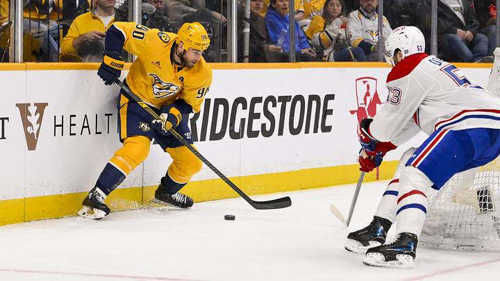 Mar 28, 2026; Nashville, Tennessee, USA;  Nashville Predators center Ryan O'Reilly (90) skates behind the net against the Montreal Canadiens during the third period Gat Bridgestone Arena. Mandatory Credit: Steve Roberts-Imagn Images