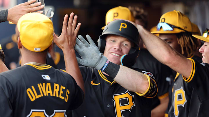 Mar 15, 2024; Tampa, Florida, USA; Pittsburgh Pirates infielder Jack Brannigan (83) celebrates with teammates in the dugout after hitting a home run during the third inning against the New York Yankees at George M. Steinbrenner Field. Mandatory Credit: Kim Klement Neitzel-Imagn Images