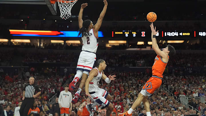Apr 4, 2026; Indianapolis, IN, USA; Illinois Fighting Illini guard Andrej Stojakovic (2) shoots against Connecticut Huskies guard Silas Demary Jr. (2) in the second half during a semifinal of the Final Four of the men's 2026 NCAA Tournament at Lucas Oil Stadium. Mandatory Credit: Robert Deutsch-Imagn Images Apr 4, 2026; Indianapolis, IN, USA; Illinois Fighting Illini guard Andrej Stojakovic (2) shoots against Connecticut Huskies guard Silas Demary Jr. (2) in the second half during a semifinal of the Final Four of the men's 2026 NCAA Tournament at Lucas Oil Stadium. Mandatory Credit: Robert Deutsch-Imagn Images