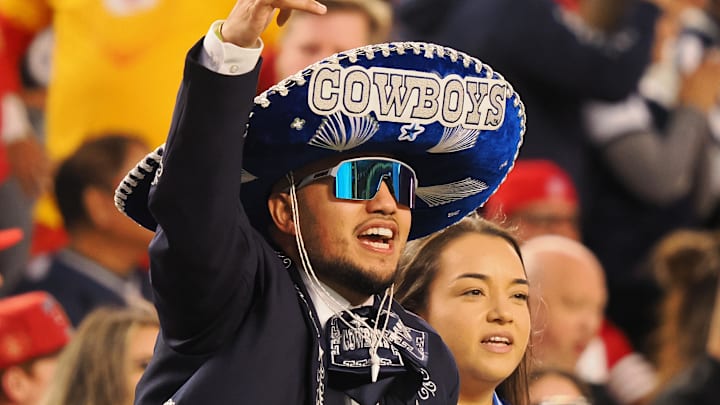 A Dallas Cowboys fan cheers during the second quarter against the San Francisco 49ers.
