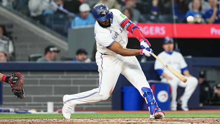 May 3, 2025; Toronto, Ontario, CAN; Toronto Blue Jays first base Vladimir Guerrero Jr. (27) hits a single against the Cleveland Guardians during the fourth inning at Rogers Centre. May 3, 2025; Toronto, Ontario, CAN; Toronto Blue Jays first base Vladimir Guerrero Jr. (27) hits a single against the Cleveland Guardians during the fourth inning at Rogers Centre.