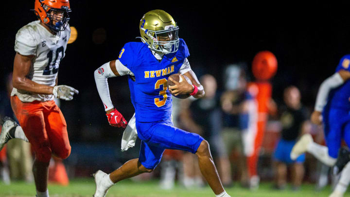 Then Cardinal Newman wide receiver Naeshaun Montgomery runs down the field against Benjamin in their regional semifinal playoff football game in West Palm Beach on November 17, 2023. He will be showcasing his skills at Miami Central this fall.