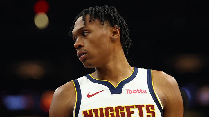 Nov 29, 2025; Phoenix, Arizona, USA; Denver Nuggets guard Peyton Watson (8) against the Phoenix Suns at the Mortgage Matchup 