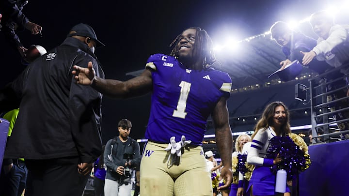 Sep 6, 2025; Seattle, Washington, USA; Washington Huskies running back Jonah Coleman (1) returns to the locker room following a victory against the UC Davis Aggies at Husky Stadium. Mandatory Credit: Joe Nicholson-Imagn Images