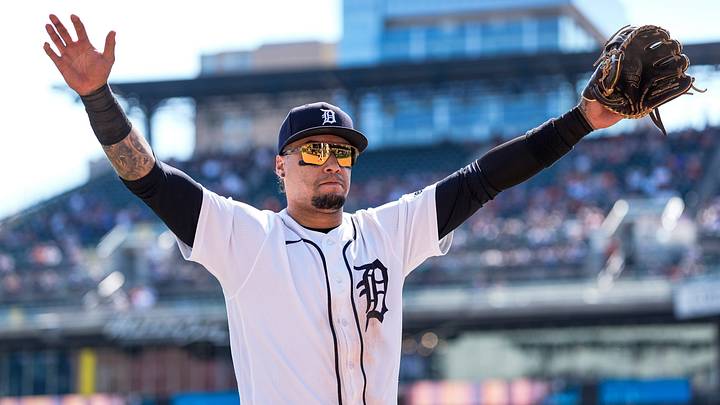 Detroit Tigers shortstop Javier Báez (28) waves at fans as he walks off the field. 