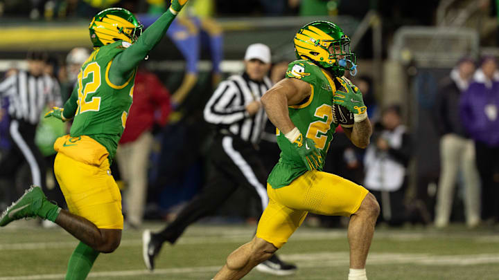 Oregon’s Jayden Limar, right, runs a blocked punt into the end zone against James Madison during the third quarter at Autzen Stadium in Eugene Dec. 20, 2025. Oregon’s Jayden Limar, right, runs a blocked punt into the end zone against James Madison during the third quarter at Autzen Stadium in Eugene Dec. 20, 2025.