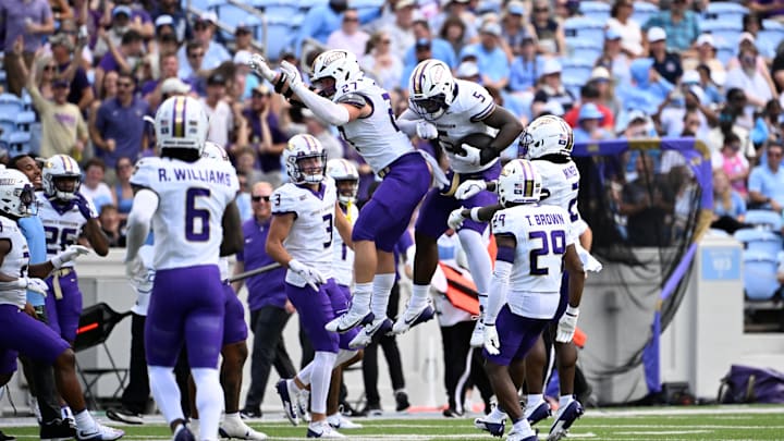 Sep 21, 2024; Chapel Hill, North Carolina, USA; James Madison Dukes linebacker Jacob Dobbs (27) and linebacker Trent Hendrick (5) react in the first quarter at Kenan Memorial Stadium. Mandatory Credit: Bob Donnan-Imagn Images