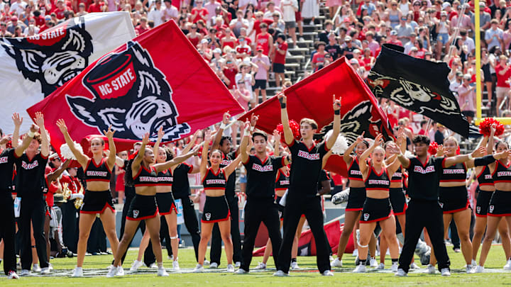 Sep 6, 2025; Raleigh, North Carolina, USA; North Carolina State Wolfpack cheerleaders before the first half of the game against Virginia Cavaliers at Carter-Finley Stadium. Mandatory Credit: Jaylynn Nash-Imagn Images
