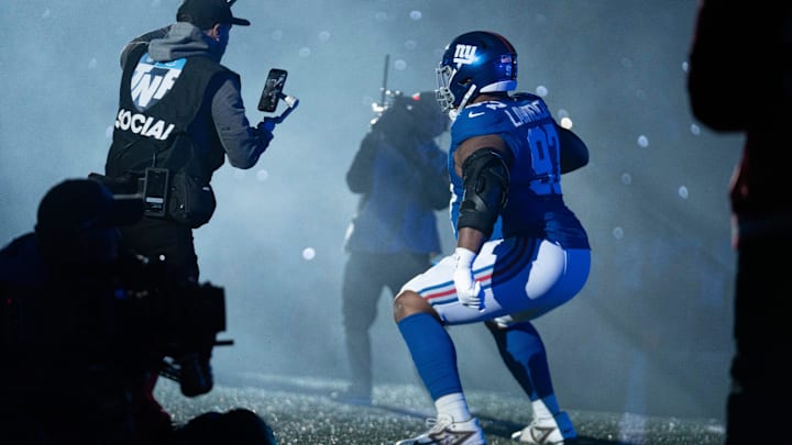 New York Giants defensive tackle Dexter Lawrence (97) dances while running out of the tunnel during a Thursday Night Football game between the New York Giants and the Philadelphia Eagles at MetLife Stadium in East Rutherford on Oct. 9, 2025.