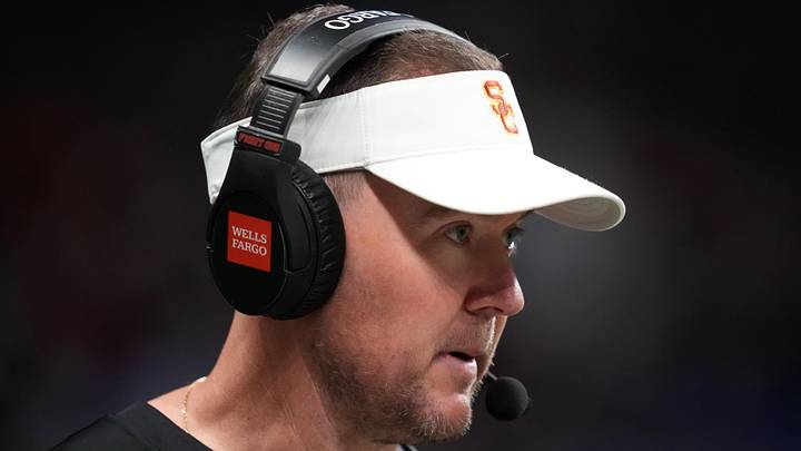 Dec 30, 2025; San Antonio, TX, USA; Southern California Trojans head coach Lincoln Riley watches in the first half against the TCU Horned Frogs during the Alamo Bowl at Alamodome. Mandatory Credit: Kirby Lee-Imagn Images Dec 30, 2025; San Antonio, TX, USA; Southern California Trojans head coach Lincoln Riley watches in the first half against the TCU Horned Frogs during the Alamo Bowl at Alamodome. Mandatory Credit: Kirby Lee-Imagn Images