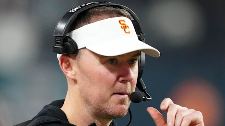 Dec 27, 2024; Las Vegas, NV, USA; Southern California Trojans head coach Lincoln Riley reacts against the Texas A&M Aggies in the second half at Allegiant Stadium. 