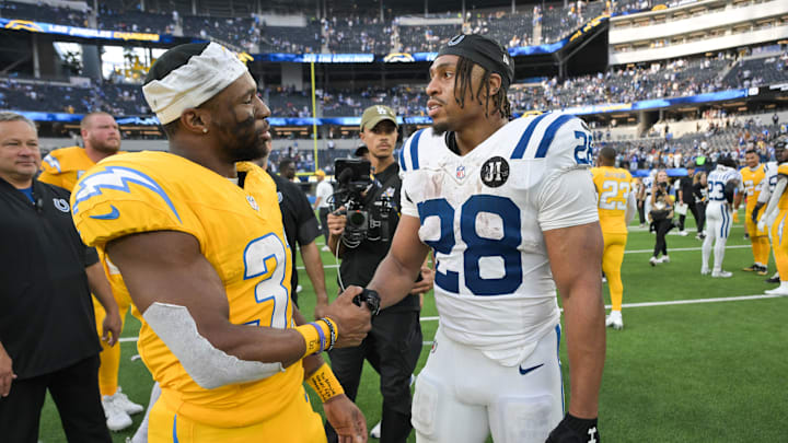 Oct 19, 2025; Inglewood, California, USA; Los Angeles Chargers running back Nyheim Hines (31) shakes hands with Indianapolis Colts running back Jonathan Taylor (28) after the game at SoFi Stadium. Mandatory Credit: Jayne Kamin-Oncea-Imagn Images