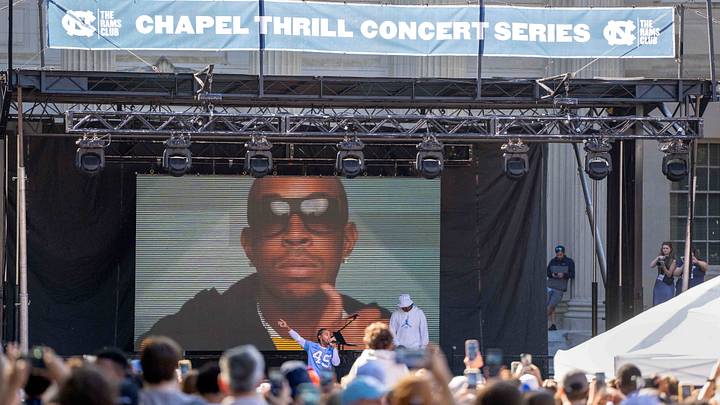 Oct 4, 2025; Chapel Hill, North Carolina, USA; Rapper Ludacris performs at Polk Place on the UNC campus before the game at Kenan Stadium. Mandatory Credit: Bob Donnan-Imagn Images