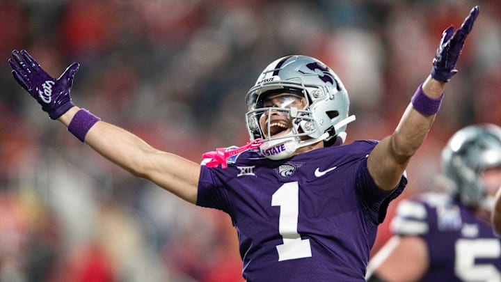 Dec 28, 2023; Orlando, FL, USA; Kansas State wide receiver Jayce Brown (1) celebrates a touchdown against NC State in the fourth quarter at Camping World Stadium. Mandatory Credit: Jeremy Reper-USA TODAY Sports