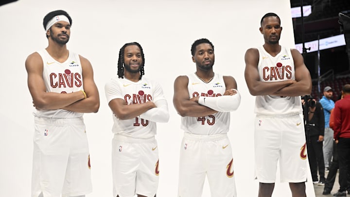 Sep 29, 2025; Cleveland, OH, USA;  Cleveland Cavaliers center Jarrett Allen (31) and guard Darius Garland (10) and guard Donovan Mitchell (45) and forward Evan Mobley (4) poses for a photo during media day at Rocket Arena. Mandatory Credit: Ken Blaze-Imagn Images