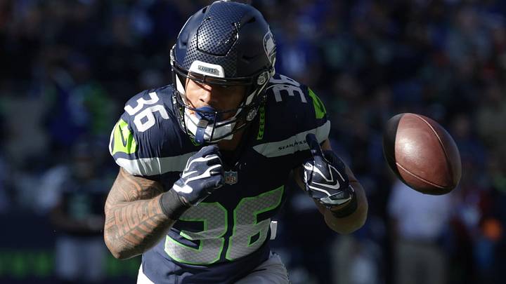 Seattle Seahawks running back George Holani fumbles the ball while running against the San Francisco 49ers. Seattle Seahawks running back George Holani fumbles the ball while running against the San Francisco 49ers.
