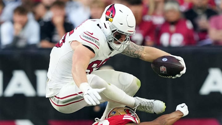 Dec 17, 2023; Glendale, Arizona, USA; Arizona Cardinals tight end Trey McBride (85) hurdles San Francisco 49ers cornerback Ambry Thomas (20) during the second half at State Farm Stadium. Mandatory Credit: Joe Camporeale-Imagn Images Dec 17, 2023; Glendale, Arizona, USA; Arizona Cardinals tight end Trey McBride (85) hurdles San Francisco 49ers cornerback Ambry Thomas (20) during the second half at State Farm Stadium. Mandatory Credit: Joe Camporeale-Imagn Images