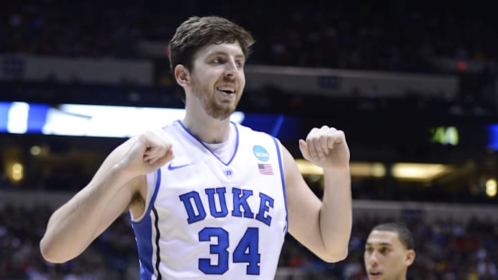 Mar 29, 2013; Indianapolis, IN, USA; Duke Blue Devils forward Ryan Kelly (34) reacts in the first half during the semifinals of the Midwest regional of the 2013 NCAA tournament against the Michigan State Spartans at Lucas Oil Stadium. Mandatory Credit: Jamie Rhodes-Imagn Images