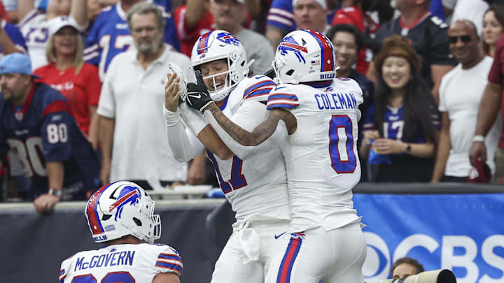 Oct 6, 2024; Houston, Texas, USA; Buffalo Bills quarterback Josh Allen (17) celebrates with wide receiver Keon Coleman (0) after a touchdown during the third quarter against the Houston Texans at NRG Stadium. Mandatory Credit: Troy Taormina-Imagn Images Oct 6, 2024; Houston, Texas, USA; Buffalo Bills quarterback Josh Allen (17) celebrates with wide receiver Keon Coleman (0) after a touchdown during the third quarter against the Houston Texans at NRG Stadium. Mandatory Credit: Troy Taormina-Imagn Images