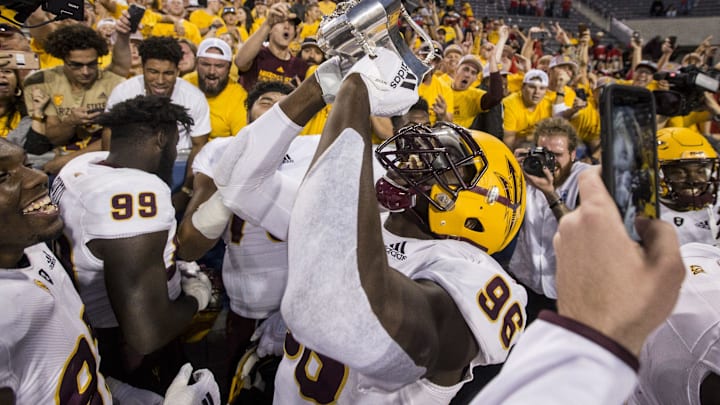 Arizona State's Jalen Bates celebrates after defeating Arizona for the Territorial Cup on Saturday, Nov. 24, 2018, at Arizona Stadium in Tucson, Ariz. Arizona State won, 41-40.
Arizona State Vs Arizona Arizona State's Jalen Bates celebrates after defeating Arizona for the Territorial Cup on Saturday, Nov. 24, 2018, at Arizona Stadium in Tucson, Ariz. Arizona State won, 41-40.
Arizona State Vs Arizona