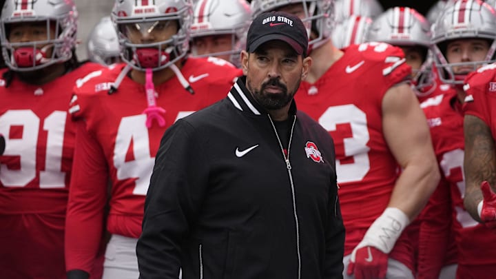 Ohio State Buckeyes head coach Ryan Day prepares to lead his team onto the field for the NCAA football game against the Indiana Hoosiers at Ohio Stadium in Columbus on Saturday, Nov. 23, 2024.