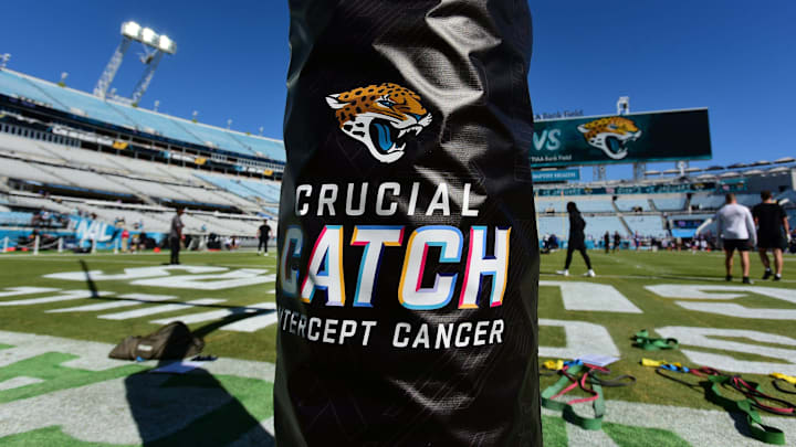 The stadium and players were decorated with the NFL's Crucial Catch logos and colors intended to raise awareness in fighting cancer through early detection and risk reduction before the start of Sunday's Jaguars vs Giants football game. The Jacksonville Jaguars hosted the New York Giants at TIAA Bank Field in Jacksonville, FL Sunday, October 23, 2022. [Bob Self/Florida Times-Union]