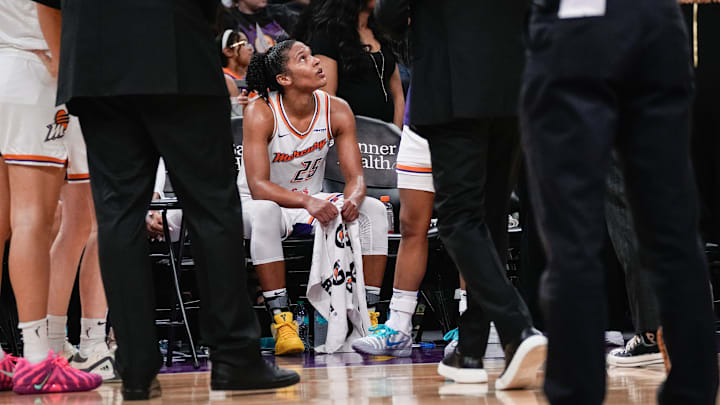 Alyssa Thomas (25) of the Phoenix Mercury looks up to the jumbotron from the bench as Phoenix challenges a call against her during a home game against the Chicago Sky at PHX Arena on Aug. 28, 2025, in Phoenix.