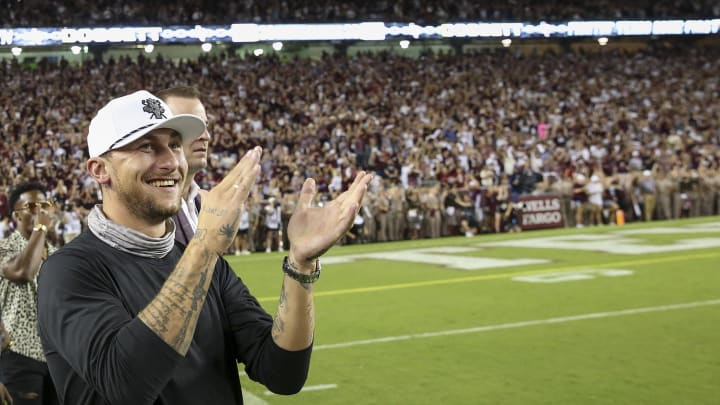 Oct 9, 2021; College Station, Texas, USA; Texas A&M Aggies alumni Johnny Manziel watches the Oct 9, 2021; College Station, Texas, USA; Texas A&M Aggies alumni Johnny Manziel watches the