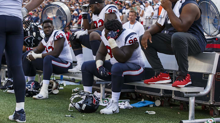 Sep 24, 2017; Foxborough, MA, USA; Houston Texans nose tackle D.J. Reader (98) and teammates react on the bench in the last seconds of play against the New England Patriots in the second half at Gillette Stadium. Mandatory Credit: David Butler II-Imagn Images
