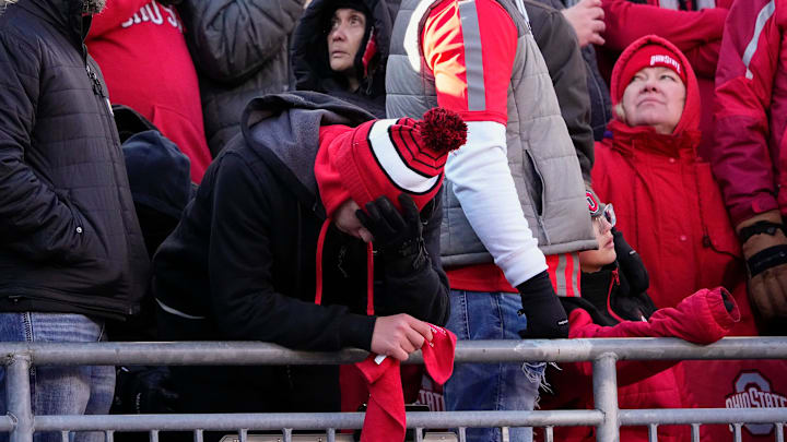 Ohio State Buckeyes fans react during the second half of the NCAA football game against the Michigan Wolverines at Ohio Stadium in Columbus on Saturday, Nov. 30, 2024. Michigan won 13-10. Ohio State Buckeyes fans react during the second half of the NCAA football game against the Michigan Wolverines at Ohio Stadium in Columbus on Saturday, Nov. 30, 2024. Michigan won 13-10.