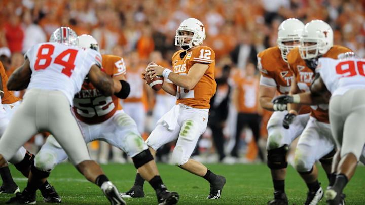 Jan. 5, 2009; Glendale, AZ, USA; Texas Longhorns quarterback Colt McCoy (12) against the Ohio State Buckeyes during the Fiesta Bowl at the University of Phoenix Stadium. Texas defeated Ohio State 24-21. Mandatory Credit: Mark J. Rebilas-Imagn Images