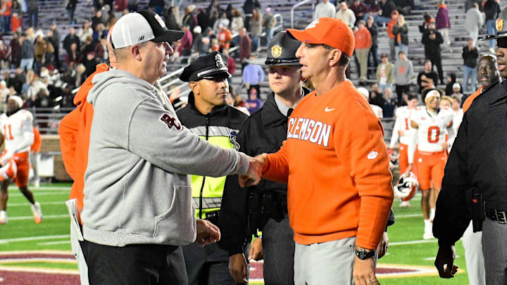 Oct 11, 2025; Chestnut Hill, Massachusetts, USA; Boston College Eagles head coach Bill O'Brien (l) and Clemson Tigers head coach Dabo Swinney shake hands after the Tigers defeated the Eagles at Alumni Stadium. Mandatory Credit: Eric Canha-Imagn Images Oct 11, 2025; Chestnut Hill, Massachusetts, USA; Boston College Eagles head coach Bill O'Brien (l) and Clemson Tigers head coach Dabo Swinney shake hands after the Tigers defeated the Eagles at Alumni Stadium. Mandatory Credit: Eric Canha-Imagn Images
