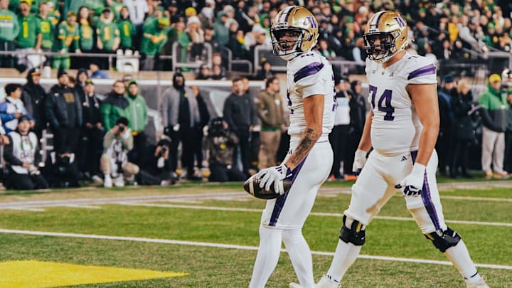 Denzel Boston is met by Drew Azzopardi (74) after scoring at Oregon.