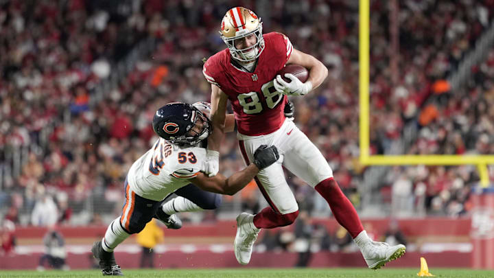 Dec 28, 2025; Santa Clara, California, USA;  Chicago Bears linebacker T.J. Edwards (53) tackles San Francisco 49ers tight end Jake Tonges (88) in the second half at Levi's Stadium. Mandatory Credit: Kyle Terada-Imagn Images