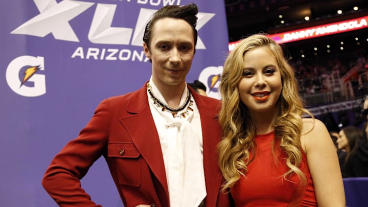 Jan 27, 2015; Phoenix, AZ, USA; NBC correspondents Tara Lipinski (right) and Johnny Weir (left) in attendance during media day for Super Bowl XLIX at US Airways Center.