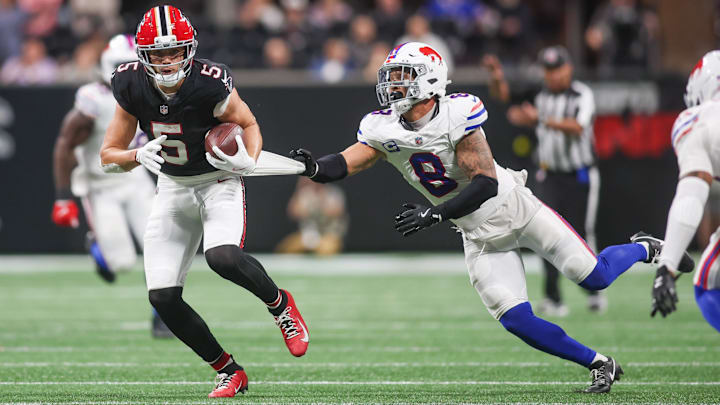 Oct 13, 2025; Atlanta, Georgia, USA; Buffalo Bills linebacker Terrel Bernard (8) attempts to drag down Atlanta Falcons wide receiver Drake London (5).