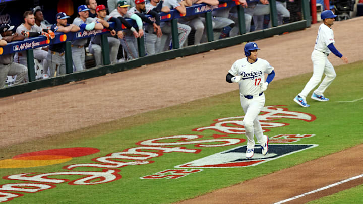 Jul 15, 2025; Cumberland, Georgia, USA; National League designated hitter Shohei Ohtani (17) of the Los Angeles Dodgers runs to home plate to score a run during the first inning during the 2025 MLB All Star Game at Truist Park. Mandatory Credit: Jordan Godfree-Imagn Images