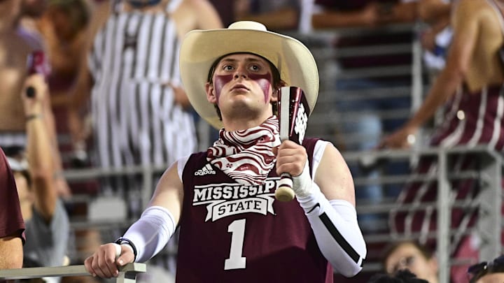 Sep 14, 2024; Starkville, Mississippi, USA; A Mississippi State Bulldogs fan reacts after a play during the second quarter of the game against the Toledo Rockets at Davis Wade Stadium at Scott Field. Mandatory Credit: Matt Bush-Imagn Images