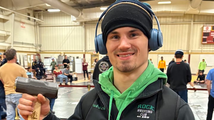 Mars volunteer assistant wrestling coach Keith Brubach has worked to balance coaching in his hometown and competing at the Rock Wrestling Club at Slippery Rock University.
