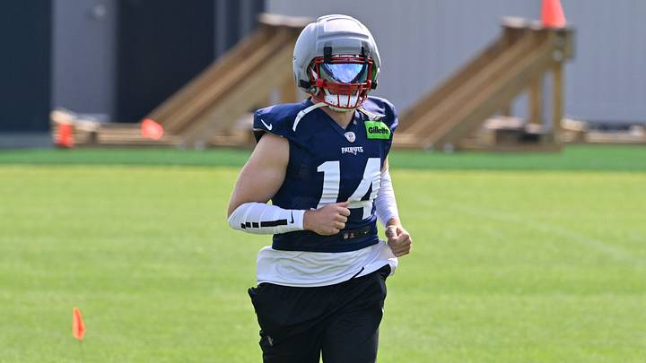 Jul 28, 2026; Foxborough, MA, USA; New England Patriots linebacker Robert Spillane (14) walks to practice for training camp at Gillette Stadium. Mandatory Credit: Eric Canha-Imagn Images Jul 28, 2026; Foxborough, MA, USA; New England Patriots linebacker Robert Spillane (14) walks to practice for training camp at Gillette Stadium. Mandatory Credit: Eric Canha-Imagn Images