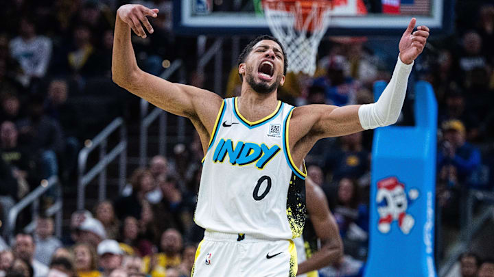 Jan 29, 2025; Indianapolis, Indiana, USA; Indiana Pacers guard Tyrese Haliburton (0) celebrates a made shot in the first half against the Detroit Pistons at Gainbridge Fieldhouse. Mandatory Credit: Trevor Ruszkowski-Imagn Images