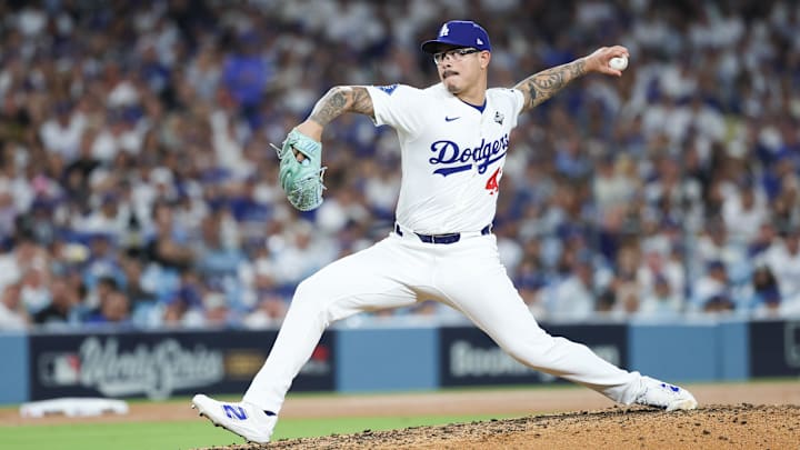 Oct 29, 2025; Los Angeles, California, USA; Los Angeles Dodgers pitcher Anthony Banda (43) pitches during the seventh inning against the Toronto Blue Jays during game five of the 2025 MLB World Series at Dodger Stadium. Mandatory Credit: Kiyoshi Mio-Imagn Images