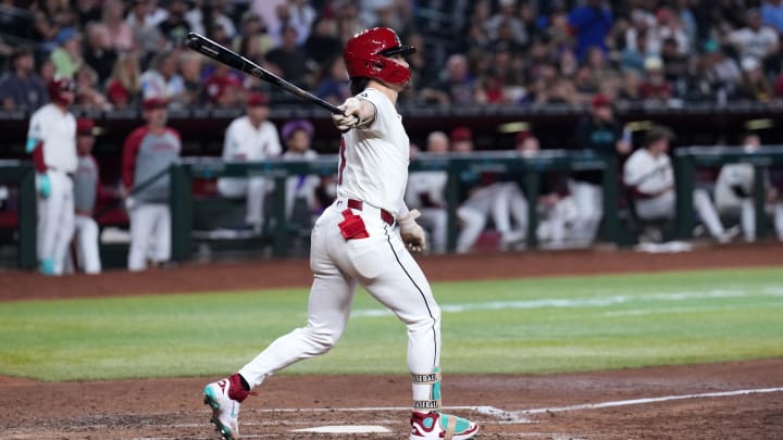 Jun 13, 2024; Phoenix, Arizona, USA; Arizona Diamondbacks outfielder Corbin Carroll (7) bats against the Los Angeles Angels during the fifth inning at Chase Field. Mandatory Credit: Joe Camporeale-USA TODAY Sports