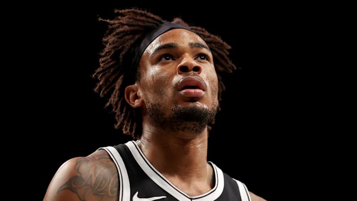 Mar 28, 2025; Brooklyn, New York, USA; Brooklyn Nets center Nic Claxton (33) reacts during the first quarter against the Los Angeles Clippers at Barclays Center. Mandatory Credit: Brad Penner-Imagn Images