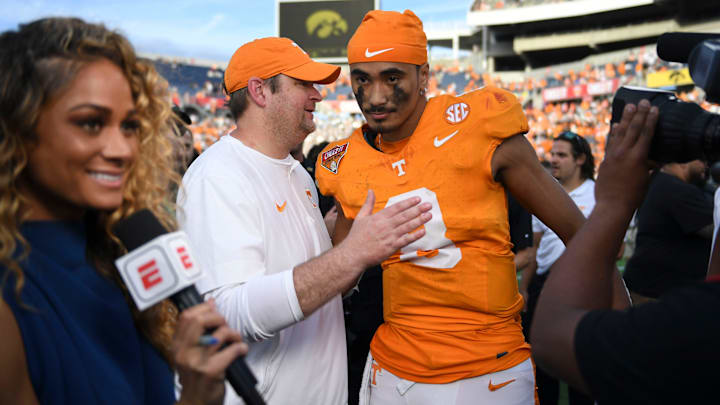 Tennessee head coach Josh Heupel turns to quarterback Nico Iamaleava (8) after their post game interview after winning the Citrus Bowl NCAA College football game on Monday, January 1, 2024 in Orlando, Fla. against Iowa.