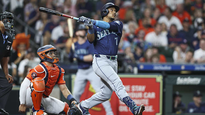 May 3, 2024; Houston, Texas, USA; Seattle Mariners second baseman Jorge Polanco (7) hits a home run during the third inning against the Houston Astros at Minute Maid Park.