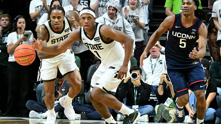Oct 20, 2026; East Lansing, MI, USA; Michigan State Spartans guard Jeremy Fears Jr. (1) grabs a loose ball and starts upcourt against the UConn Huskies during the second half at Breslin Center. Mandatory Credit: Dale Young-Imagn Images Oct 20, 2026; East Lansing, MI, USA; Michigan State Spartans guard Jeremy Fears Jr. (1) grabs a loose ball and starts upcourt against the UConn Huskies during the second half at Breslin Center. Mandatory Credit: Dale Young-Imagn Images