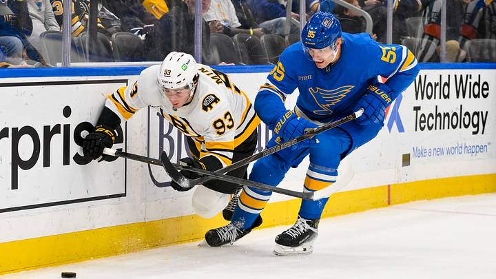 Dec 9, 2025; St. Louis, Missouri, USA; Boston Bruins center Fraser Minten (93) and St. Louis Blues defenseman Colton Parayko (55) battle for the puck during the third period at Enterprise Center. Mandatory Credit: Jeff Curry-Imagn Images Dec 9, 2025; St. Louis, Missouri, USA; Boston Bruins center Fraser Minten (93) and St. Louis Blues defenseman Colton Parayko (55) battle for the puck during the third period at Enterprise Center. Mandatory Credit: Jeff Curry-Imagn Images