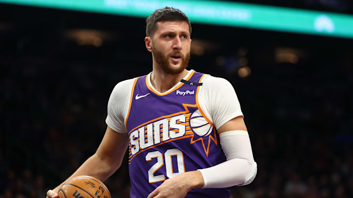 Dec 27, 2024; Phoenix, Arizona, USA; Phoenix Suns center Jusuf Nurkic (20) against the Dallas Mavericks at Footprint Center. Mandatory Credit: Mark J. Rebilas-Imagn Images